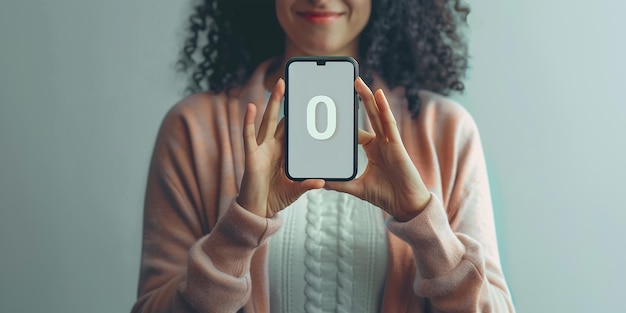 Photo woman holding a phone with handmade ok shape