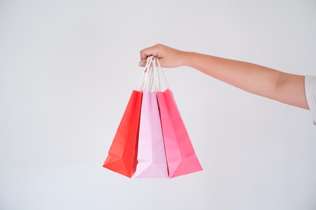 woman holding shopping bag