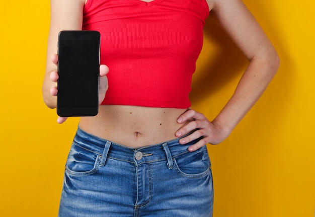 Woman holding a smartphone in her hand