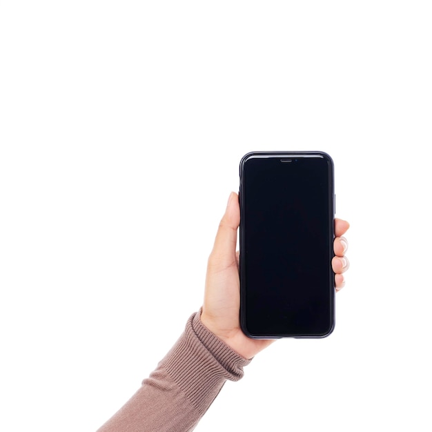 Woman holding smartphone with blank screen