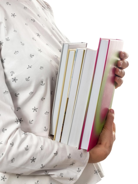 Woman holding stack of books Education studying homework and exam preparation concept