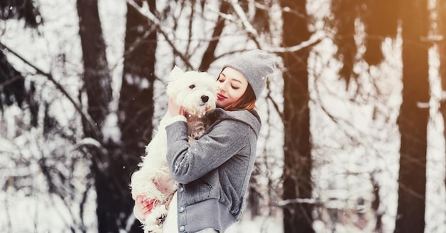 Woman hugging a dog