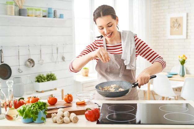 Woman is preparing proper meal