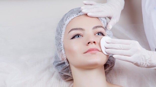 The woman is relaxingWoman Getting Facial Treatment in Beauty Salon