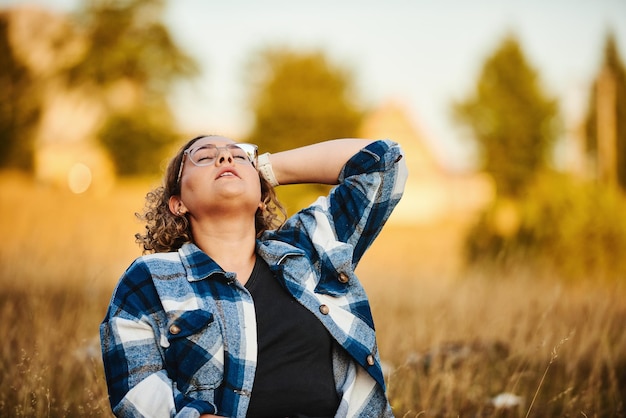 The woman is resting from hiking in nature Selective focus