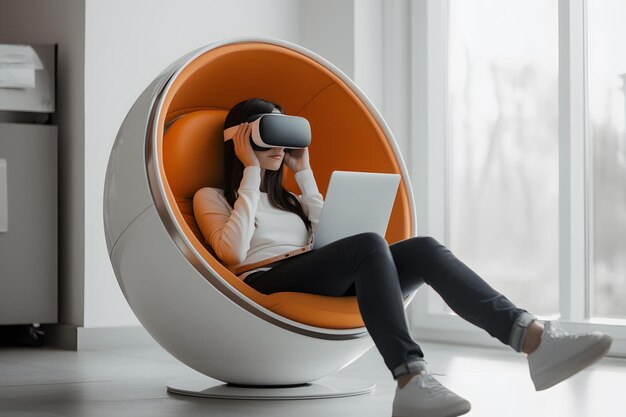 Photo a woman is sitting in an orange chair with a laptop and has a screen that says no