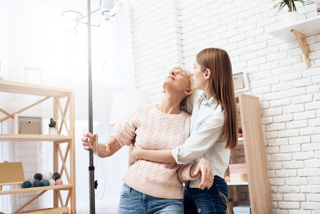 Woman is standing with help of drop counter pole.