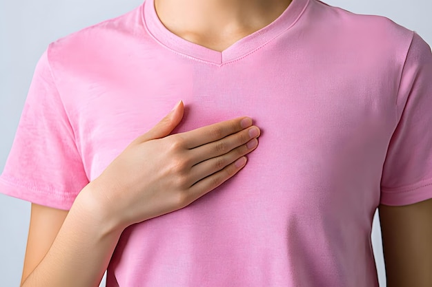 a woman is wearing a pink shirt that says t shirt