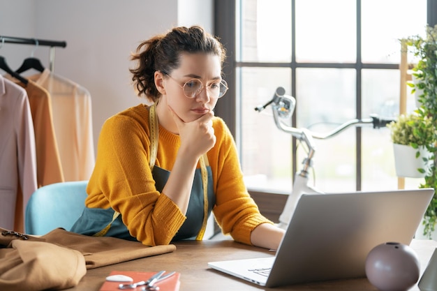 Woman is working at workshop