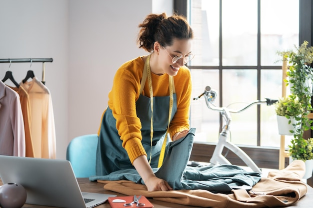 Woman is working at workshop