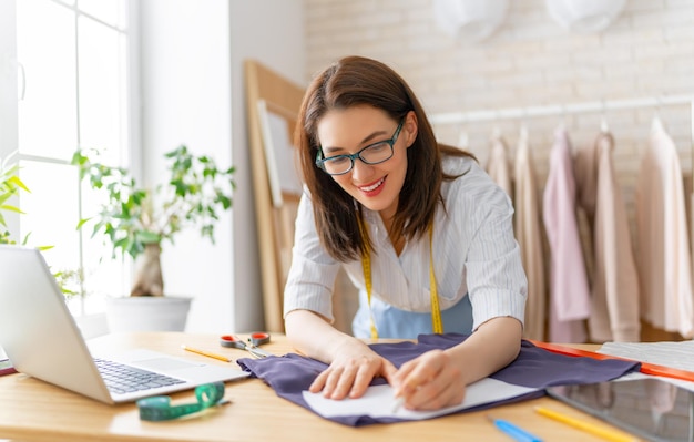 Woman is working at workshop