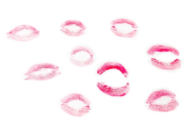 Woman kiss isolated on white background. Red lipstick.