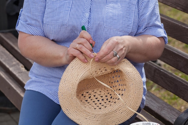 Woman knitting a handmade hat