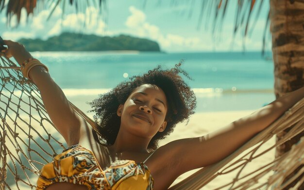 a woman laying on a beach with a palm tree in the background