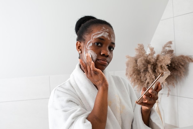 Woman learing to do skincare procedures at home