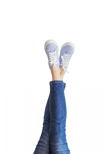 Woman legs in a blue jeans