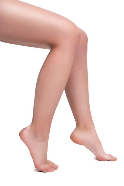 Woman legs on white