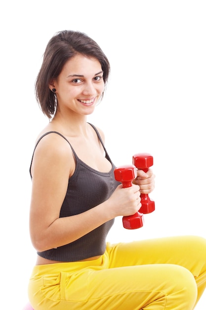 Woman lifting dumbbells