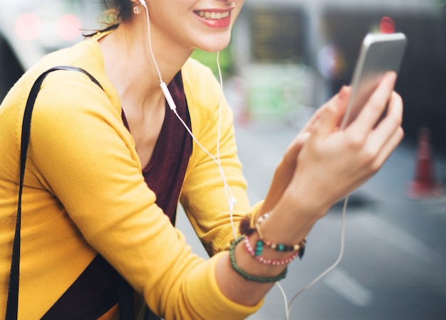 Photo woman listening music media entertainment traveling concept