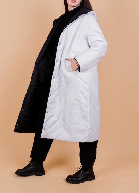 Woman in Long White Coat Vertical photo