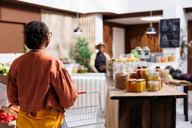 Woman looking for fresh produce in store