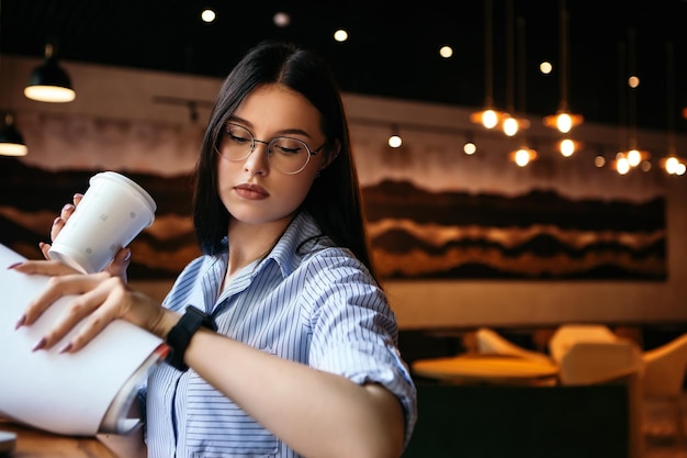 Woman looking on her smart watch