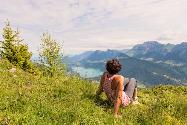 A woman looking at the mountain