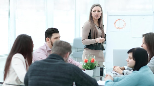 Woman making a business presentation to a group