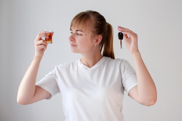 Woman making a choice between alcohol and driving