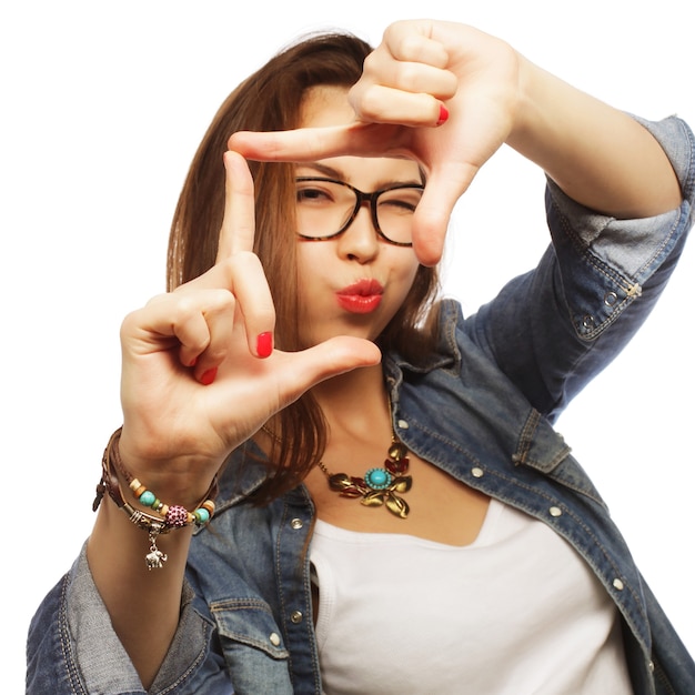 Woman making frame with hands, happy time