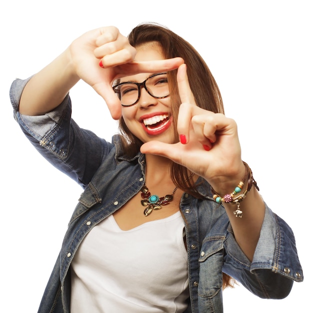 Woman making frame with hands happy time