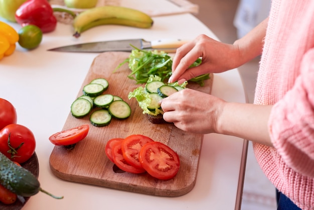 Woman making a healthy sandwich