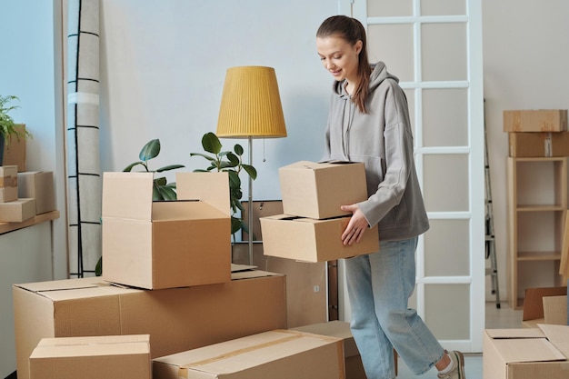 Woman moving to a new house