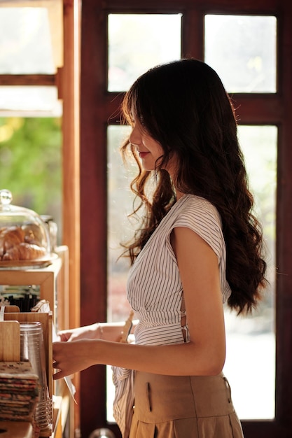 Woman Ordering Drink