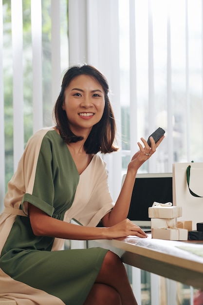 Woman packing handmade soap