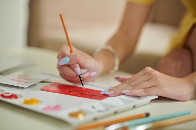 Woman Painting Greeting Cards