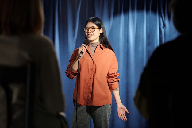 Woman performing in front of audience