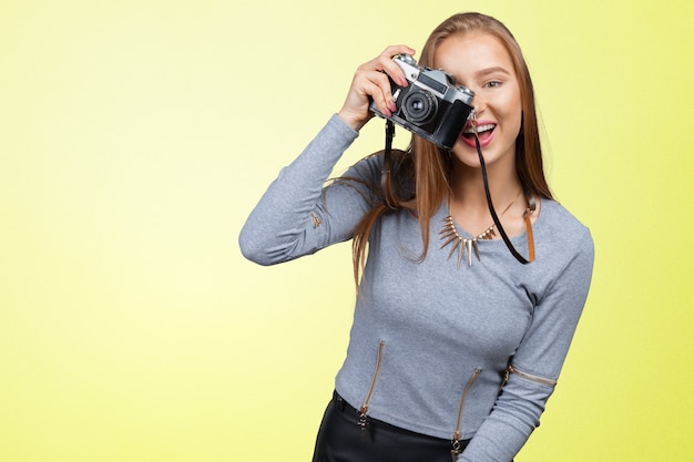 Woman photographer with camera