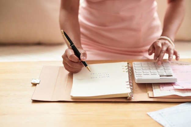 Woman planning her home budget