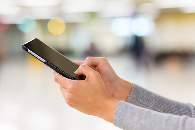 Woman play game on smart phone