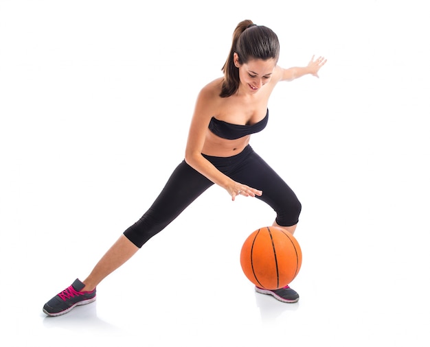 Woman playing baktetball