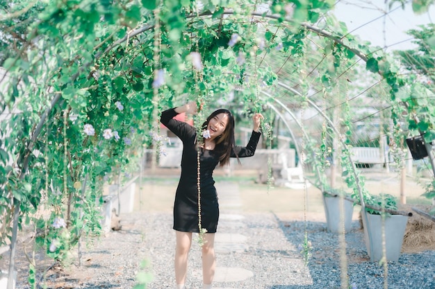 Woman playing fun happy flower tunnel