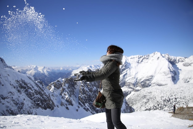 A woman playing at sky station in the city of Innsbruck Austria