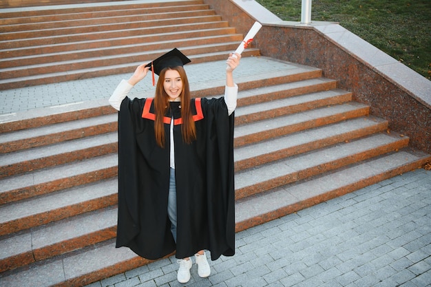 Woman portrait on her graduation day University Education graduation and people concept