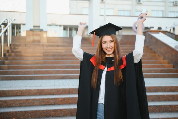 Woman portrait on her graduation day University Education graduation and people concept