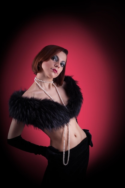 Woman portrait with fur boa in retro style