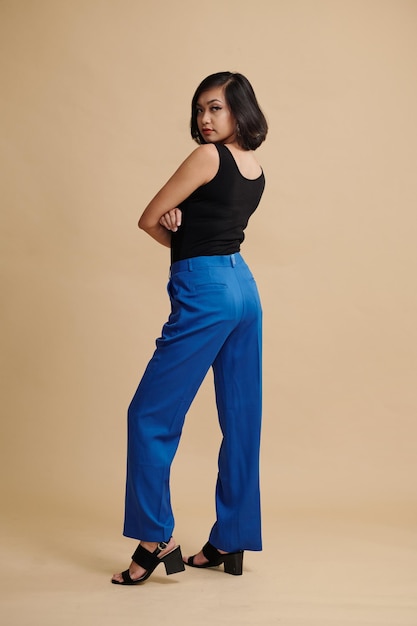 Woman posing in elegant pantsuit