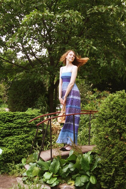 Woman posing in summer park