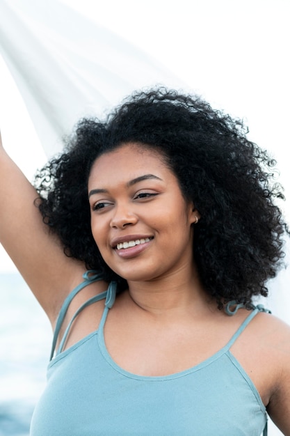 Woman posing with cloth close up