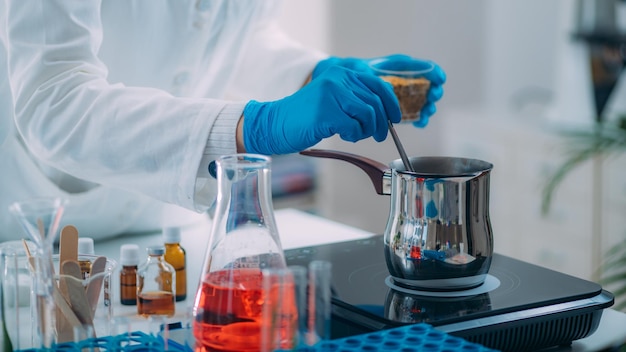 Woman Preparing Cosmetic Beauty Cream in Lab